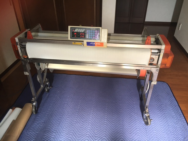 クロス糊付け機械